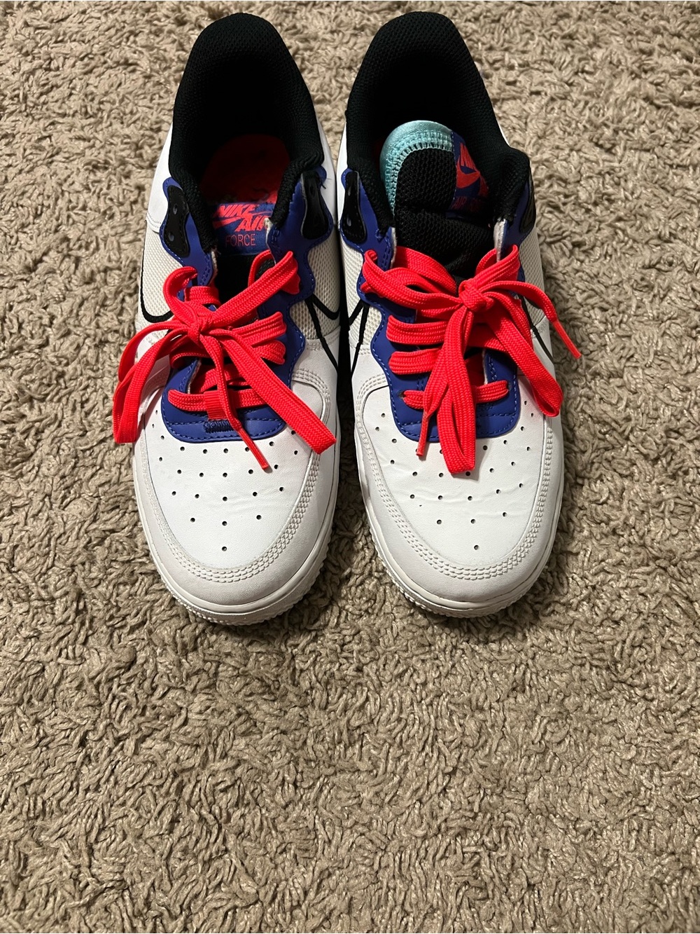 Nike Kids White Sneakers with Blue Panels and Bright Red Laces